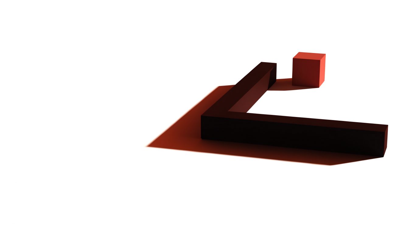 A black corner bracket lying flat with a long shadow; a red cube rests outside it